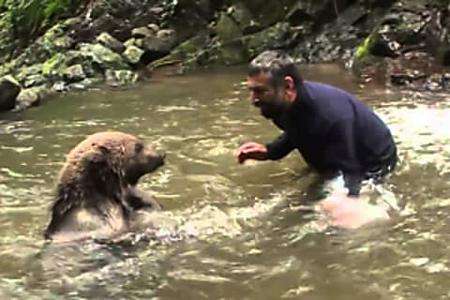 Outbrain Ad Example 65211 - [Photos] Mama Bear Does This After Man Saves Her Drowning Cubs