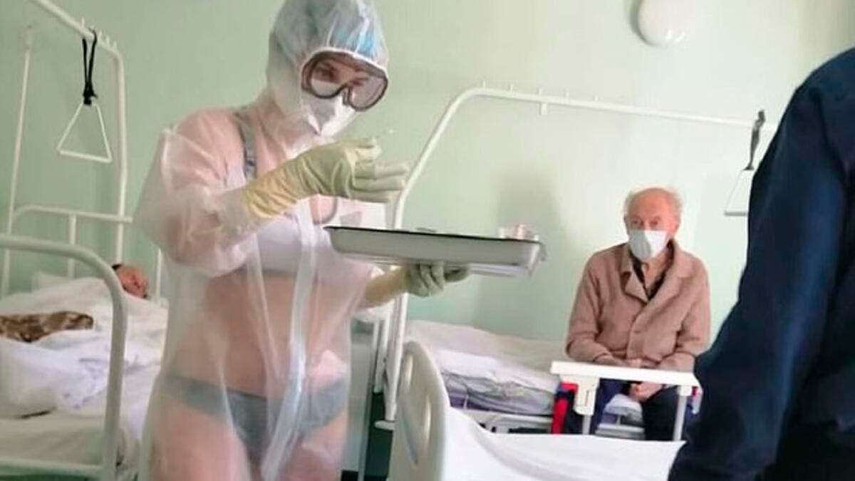 Taboola Ad Example 39436 - 'It's Too Hot': Russian Nurse Strips Down To Her Underwear While Treating Patients, Suspended