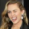 Zergnet Ad Example 62305 - Miley Cyrus Rocks Open Blazer To The Grammy Awards